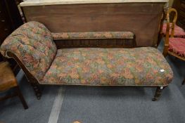 A Victorian chaise longue.