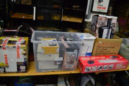 A metal detector, boxed kitchen items etc.