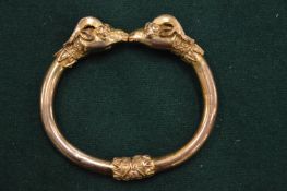 A silver gilt torque style bangle.