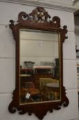 A Georgian style fretwork framed wall mirror.