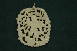Chinese carved and pierced jade pendant.