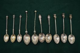 A group of silver spoons with decorative terminals (29).