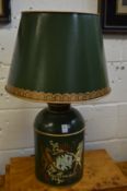 A large green Toleware style tea canister table lamp with armorial decoration.