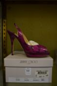 A pair of Jimmy Choo ladies Clue magenta coloured high heeled shoes, size 38½, unused with