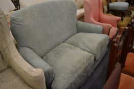 A small two seater settee.