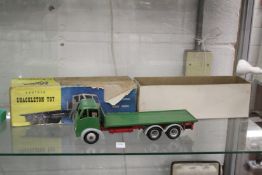 A Shackleton Toy Foden clockwork flatbed truck with original box.