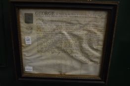A George III document, framed and glazed.