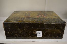 A black lacquer chinoiserie decorated sewing box.