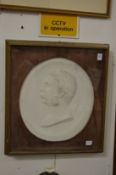 A large relief cast plaster portrait plaque depicting Prince Albert (?), framed and glazed.