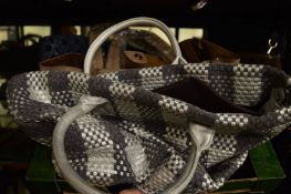 Quantity of ladies handbags.