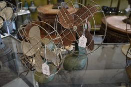 Two early electric fans.