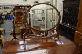 A dressing table mirror.