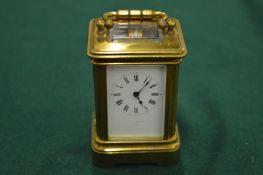 A miniature carriage clock.