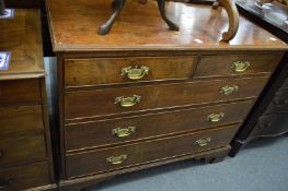 A George III oak chest of drawers.