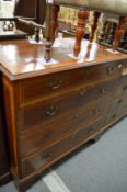 An Edwards & Roberts mahogany and satinwood cross banded four drawer chest.