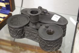 A good black basalt desk stand.