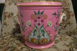 A pink ground floral decorated Cachepot.