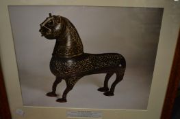 A watercolour and two prints.