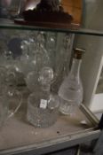 Four cut glass decanters.