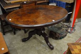 A small Victorian walnut tilt-top breakfast table.