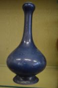 A Chinese blue glaze garlic head bottle vase (damage to foot rim).