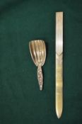 An Aspreys silver gilt letter opener and caddy spoon.