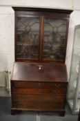 A mahogany bureau bookcase.