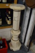 An alabaster column.