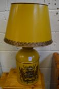 A pair of large yellow Toleware style tea canister table lamps with armorial decoration.