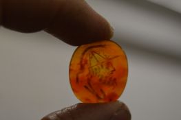 A carved intaglio bust.