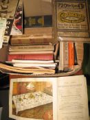 A box of cookery books and pamphlets.