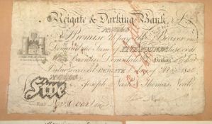 REIGATE & DORKING BANK, an engraved 5 pound Sterling cheque, cut in two & laid on album leaf, ms.