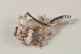 A GOOD 18CT GOLD, DIAMOND. RUBY AND SAPPHIRE FLORAL BROOCH, mounted 