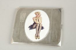 A SILVER ENGINE TURNED CIGARETTE CASE, Birmingham 1921, with glamour model oval plaque. 210grms.