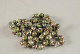 A CLOISONNE ENAMEL BEAD NECKLACE. 80cms long.