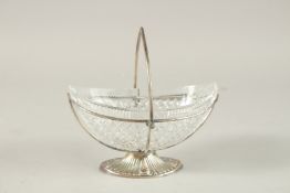 A GOOD SILVER AND CUT GLASS BOX SHAPED BASKET with swing handle.