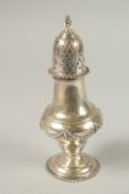 A CLASSICAL SILVER SUGAR SIFTER decorated with garlands. 18cm high. London 1912, weight: 9ozs.