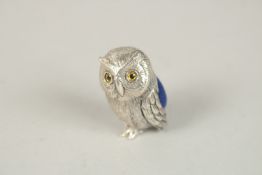 A SILVER OWL PIN CUSHION. 3.5cms.