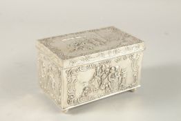 A GOOD DUTCH SILVER CASKET repousse with figures, on ball feet. 14cms long x 9cms wide x 90cms high.