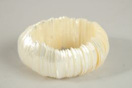 A SHELL FLEXIBLE BRACELET.
