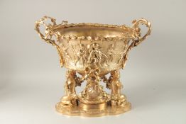 A GOOD CLASSICAL GILT BRONZE OVAL TWO HANDLED CENTREPIECE BOWL decorated with cupids, fruiting