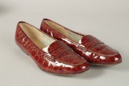 A PAIR OF SALVATORE FERRAGAMO PATENT LEATHER SHOES. Size 38.
