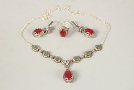 A SILVER AND GILT CHALCEDONY NECKLACE, EARRINGS AND RING SET.