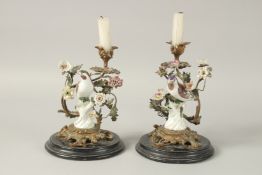 A RARE PAIR OF 18TH CENTURY BERLIN PORCELAIN AND GILT METAL CANDELABRA with porcelain birds and