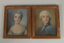 A VERY GOOD PAIR OF 18th - 19th CENTURY FRENCH PASTEL PORTRAITS of a young girl and man, half