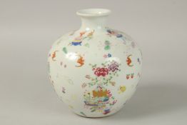 A CHINESE POLYCHROME PORCELAIN BULBOUS VASE, with flowers, bats and precious objects. 19cms high.