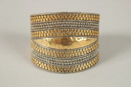 A SILVER GILDED BRACELET.