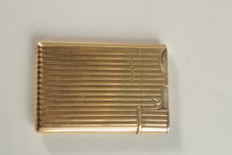 A. & CO. LTD, A SILVER GILT LIGHTER.