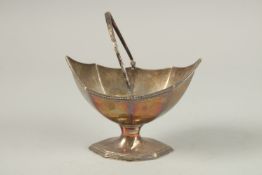 A GEORGE III SILVER SUGAR BASKET with swing handle. London 1804.