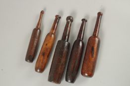 FIVE TREEN BATS. 26cms high.